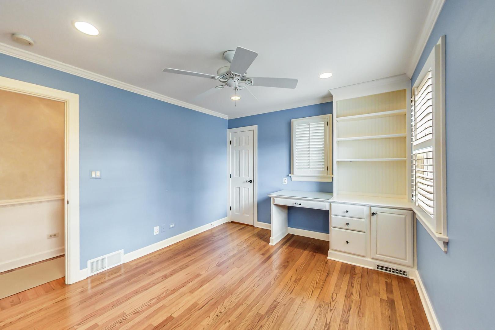 150 Firth Road Inverness, IL 60067 - Photo 58 of 83 a view of empty room with wooden floor and fan