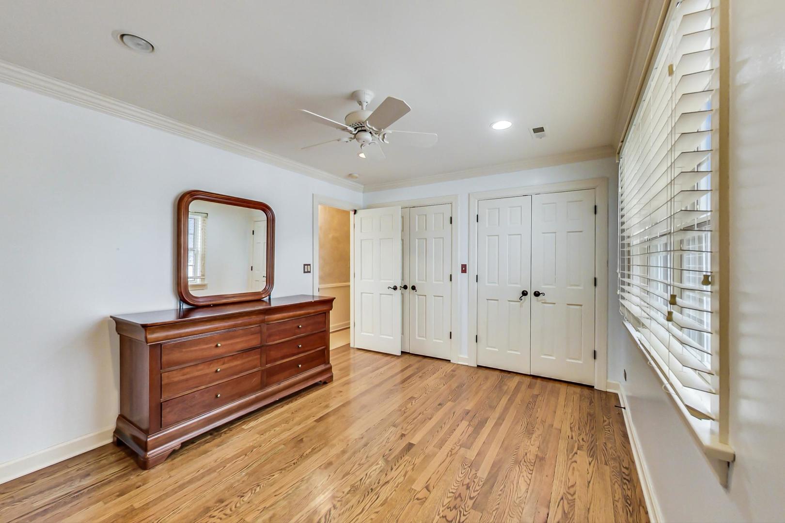150 Firth Road Inverness, IL 60067 - Photo 63 of 83 a view of room with hardwood floor and ceiling fan