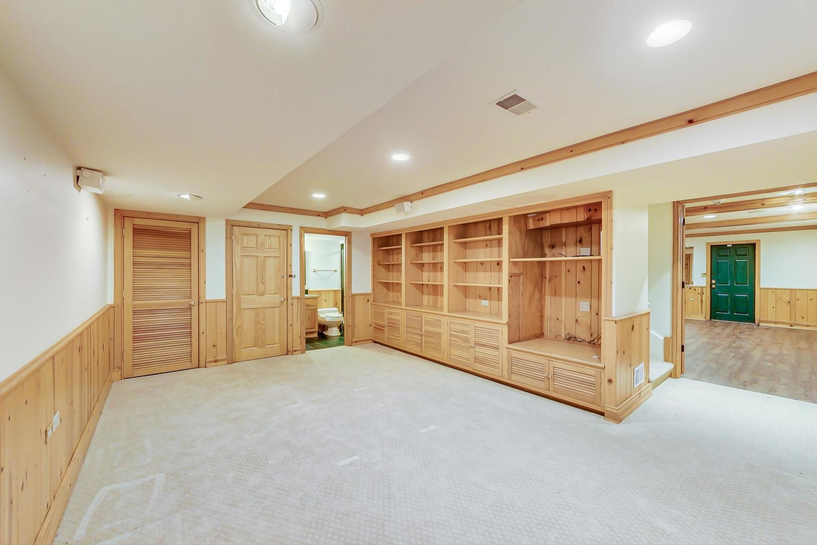 150 Firth Road Inverness, IL 60067 - Photo 71 of 83 a view of an empty room with glass door