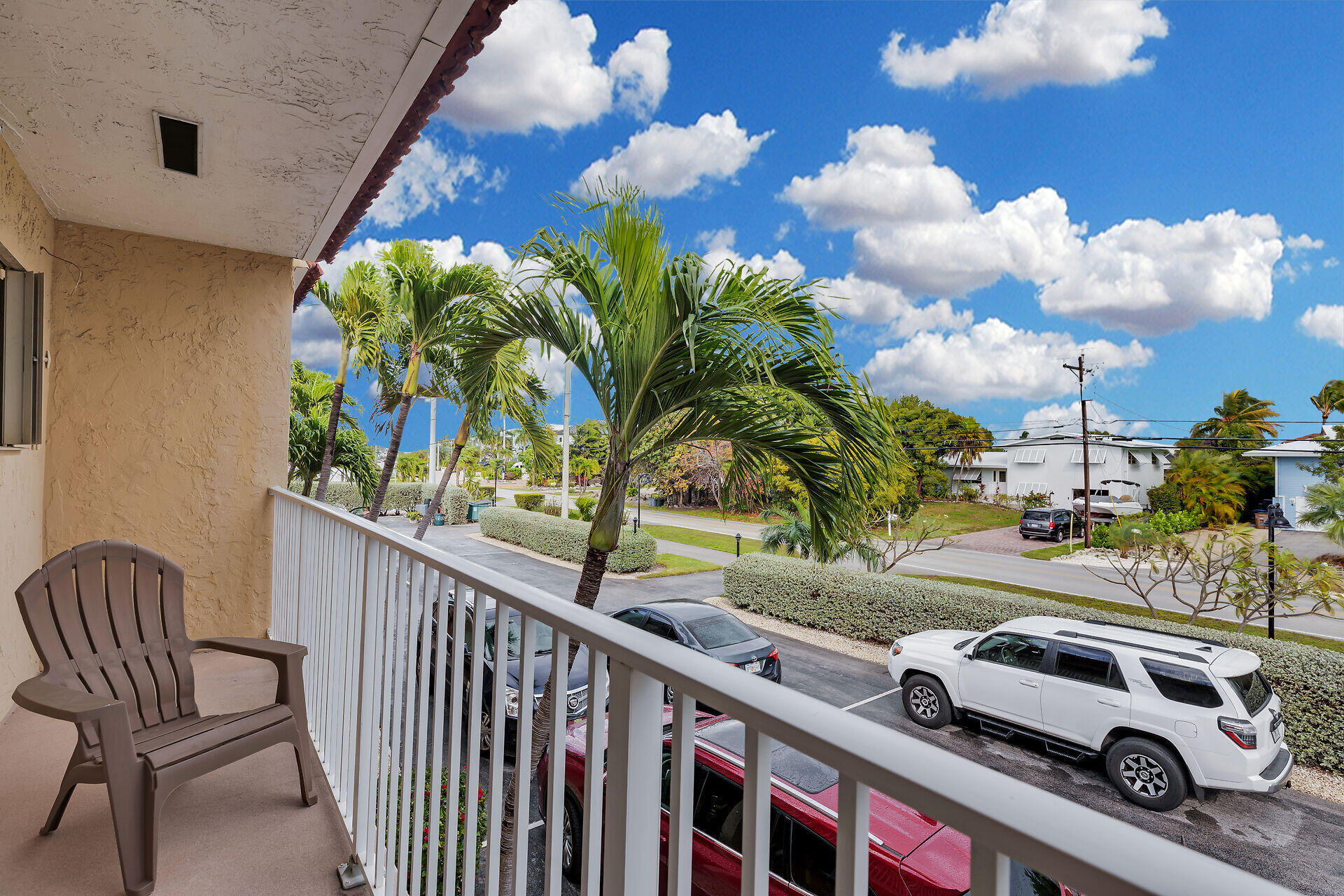 423 Sombrero Beach Road, Unit 9 Marathon, FL 33050 - Photo 17 of 42 a view of a car park in front of a house