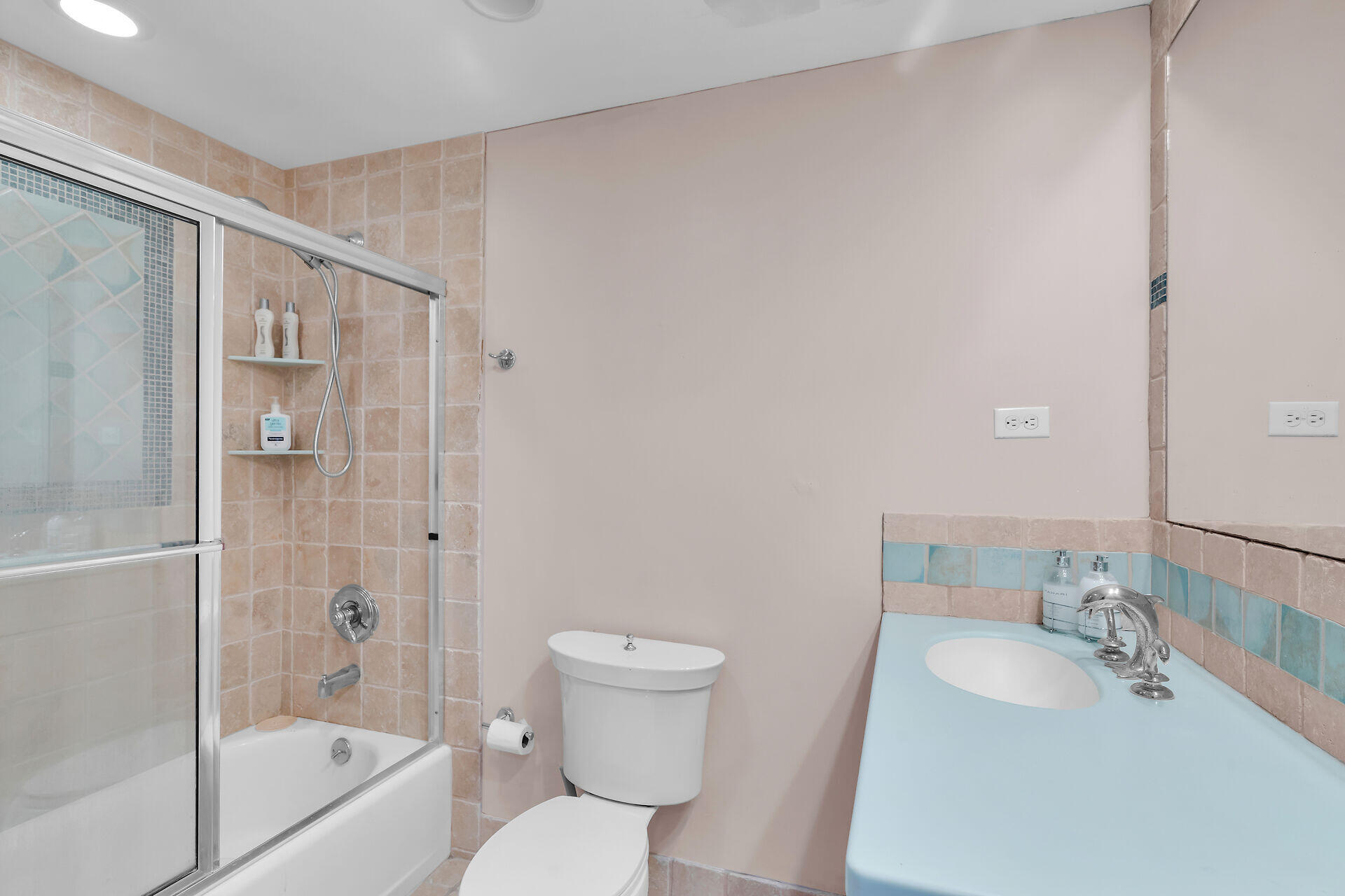 423 Sombrero Beach Road, Unit 9 Marathon, FL 33050 - Photo 24 of 42 a bathroom with a sink toilet and shower