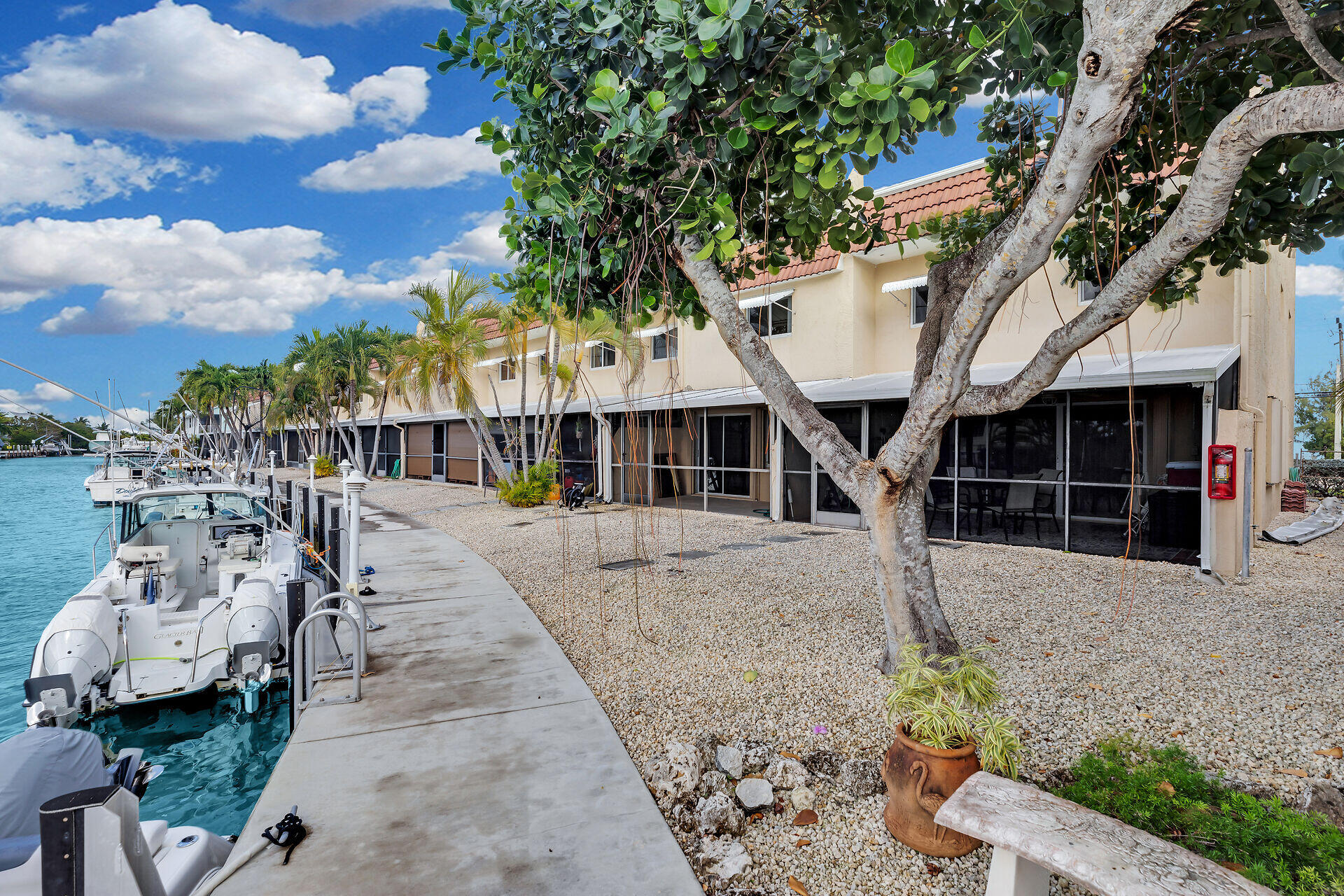 423 Sombrero Beach Road, Unit 9 Marathon, FL 33050 - Photo 34 of 42 Waterfront Walkway Along Units