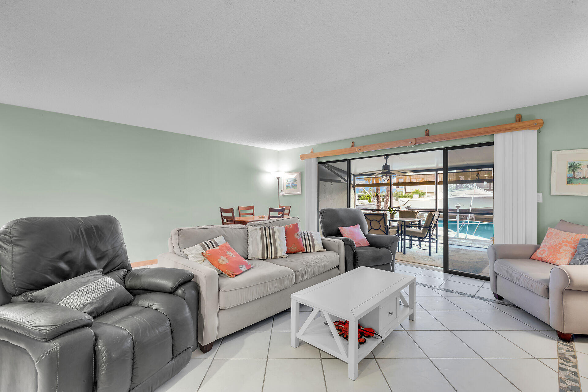 423 Sombrero Beach Road, Unit 9 Marathon, FL 33050 - Photo 5 of 42 Living Room Sliders to Patio