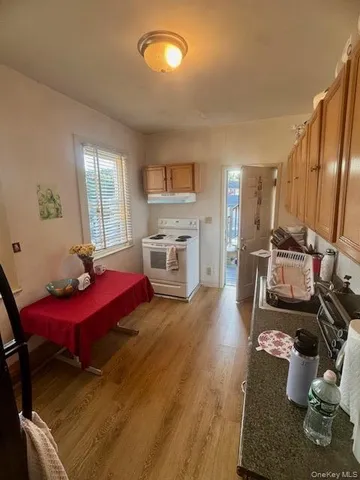 a bathroom with a sink toilet and vanity