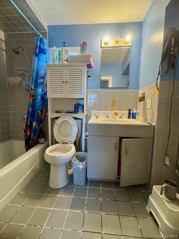 a kitchen with stainless steel appliances granite countertop a sink and a granite counter tops with a large window