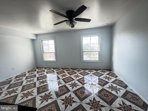 9110 Canterbury Riding, Unit 129 Laurel, MD 20723 - Photo 5 of 20 a bedroom with a bed and a window