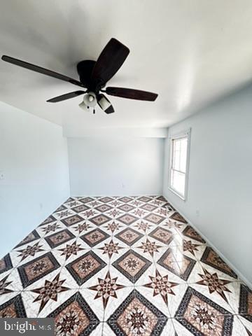 9110 Canterbury Riding, Unit 129 Laurel, MD 20723 - Photo 7 of 20 a bedroom with a bed and a window