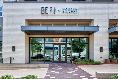 a view of a building with sitting area
