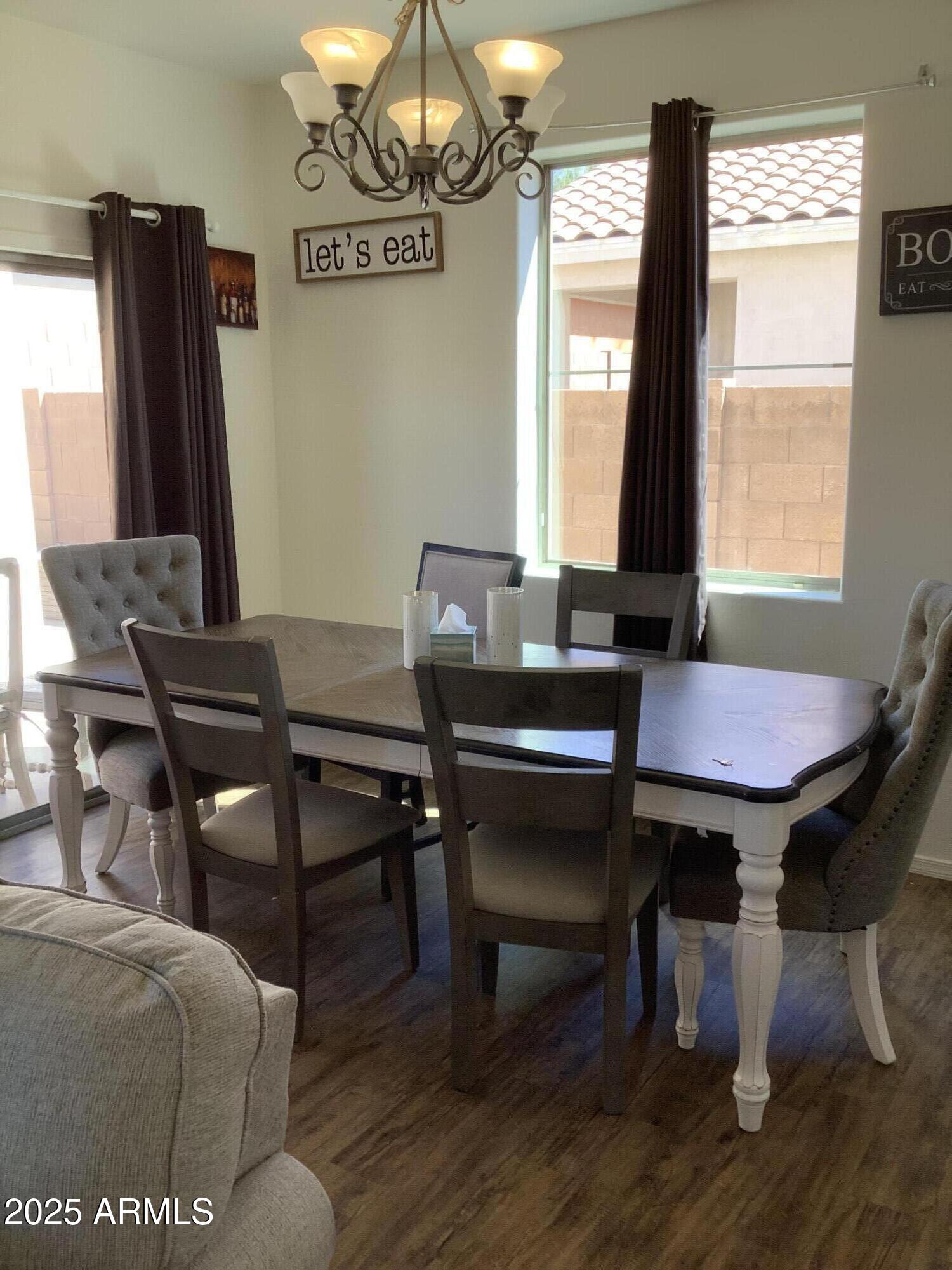3873 East Palmer Street Gilbert, AZ 85298 - Photo 4 of 8 a view of a livingroom with furniture and a window