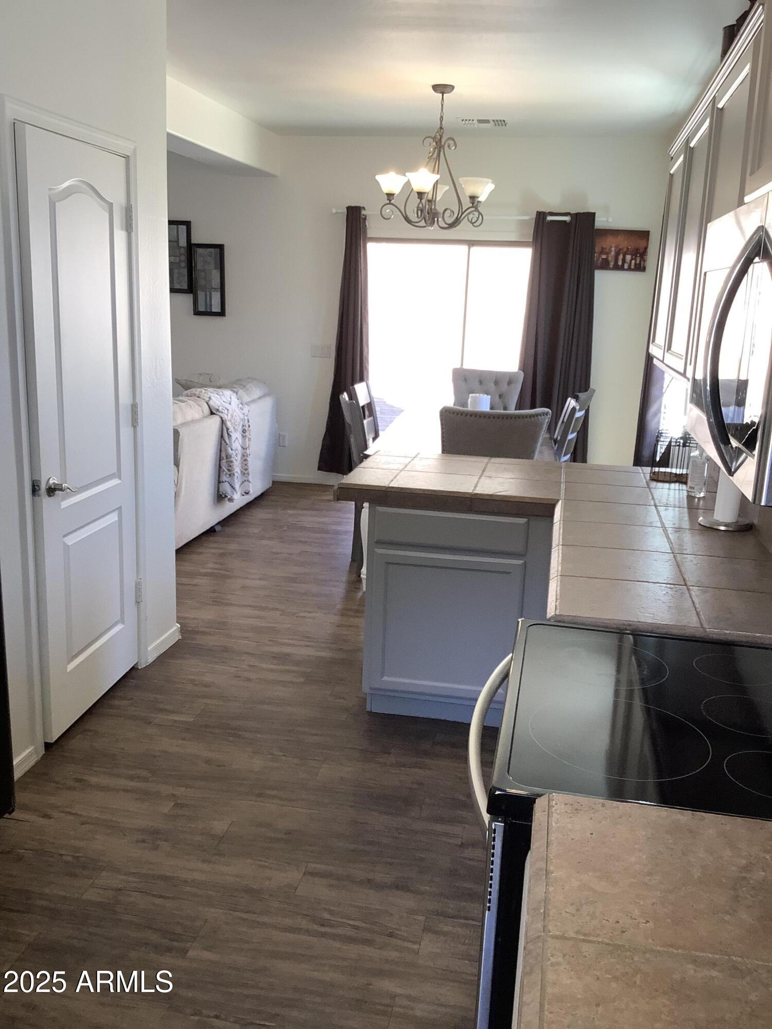 3873 East Palmer Street Gilbert, AZ 85298 - Photo 5 of 8 a view of a living room and dining room