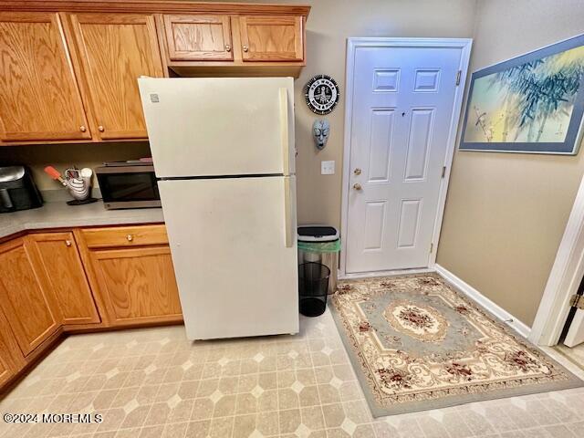 185 Liddle Avenue Edison, NJ 08837 - Photo 15 of 19 a refrigerator freezer sitting inside of a kitchen
