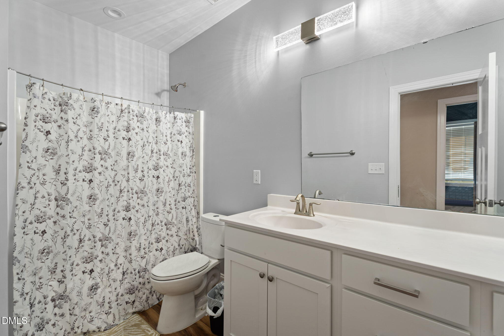 202 South 6th Street Erwin, NC 28339 - Photo 21 of 35 a bathroom with a sink toilet and shower