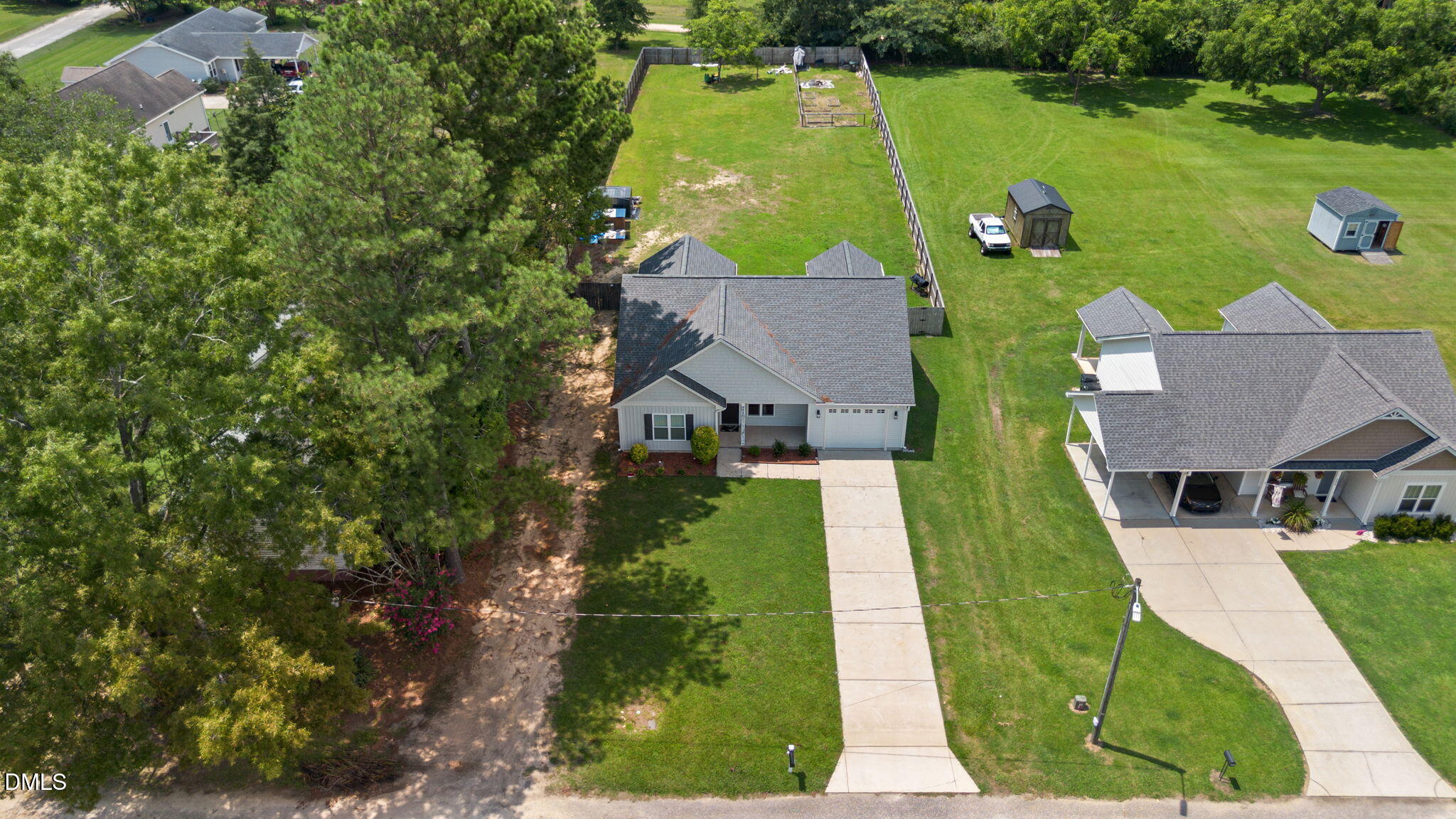 202 South 6th Street Erwin, NC 28339 - Photo 2 of 35 an aerial view of a house with yard swimming pool and outdoor seating