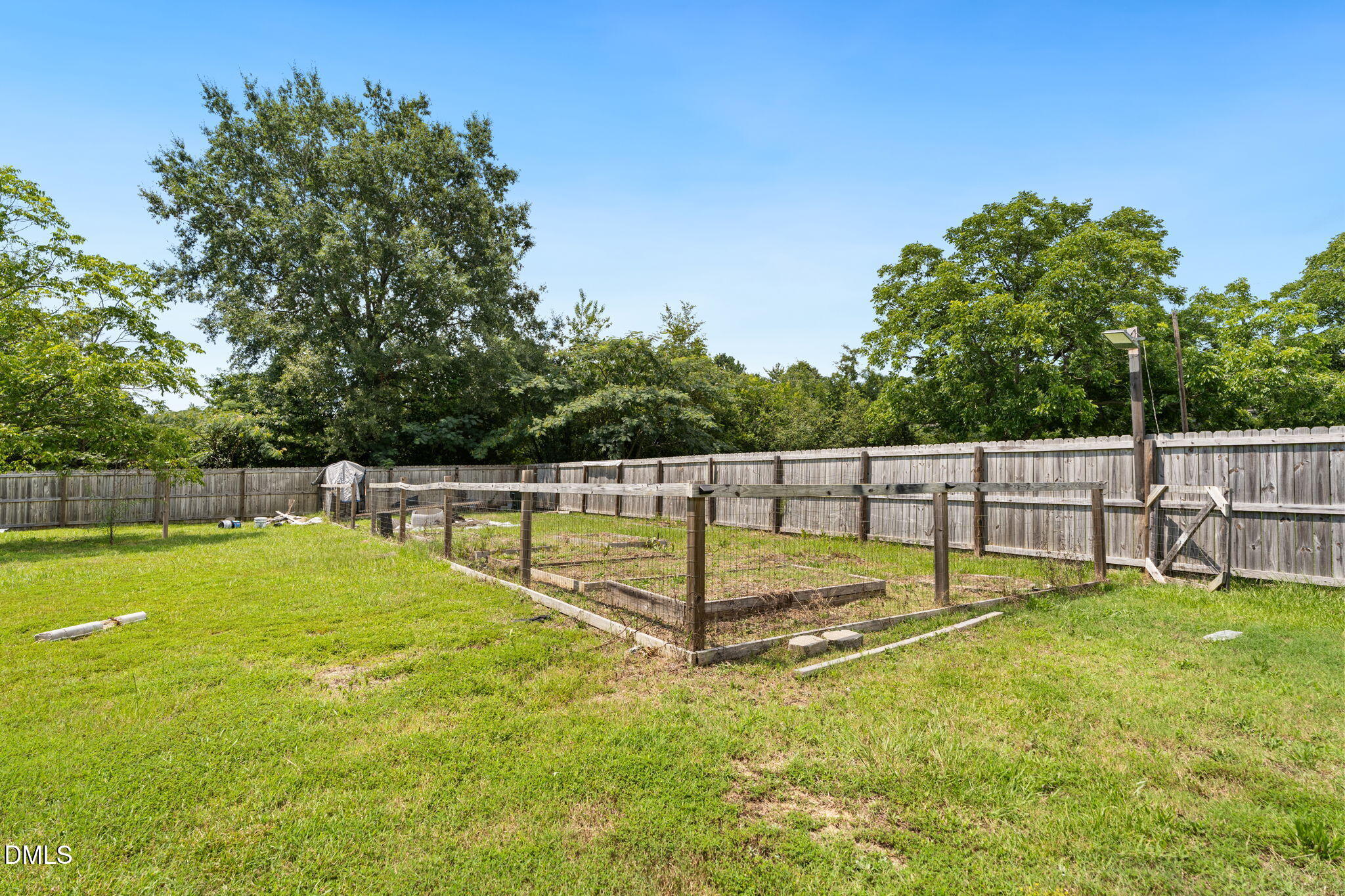 202 South 6th Street Erwin, NC 28339 - Photo 32 of 35 a view of a swimming pool with a yard