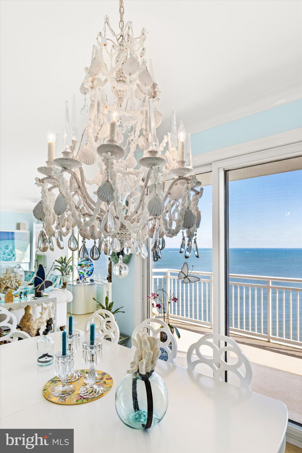 2 48th Street, Unit 1612 Ocean City, MD 21842 - Photo 11 of 90 a dining room with wooden floor table and chairs