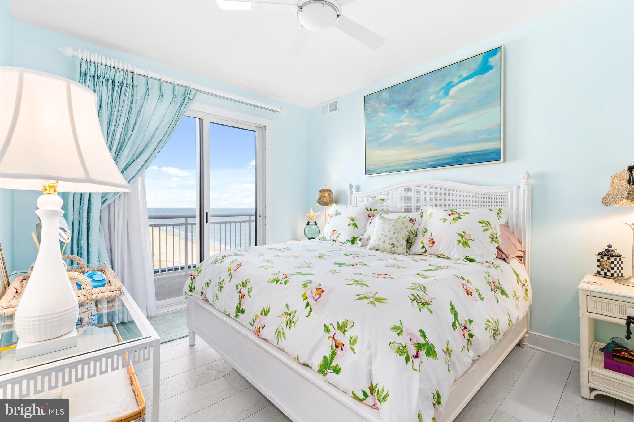 2 48th Street, Unit 1612 Ocean City, MD 21842 - Photo 34 of 90 a bedroom with a bed and a painting on the wall