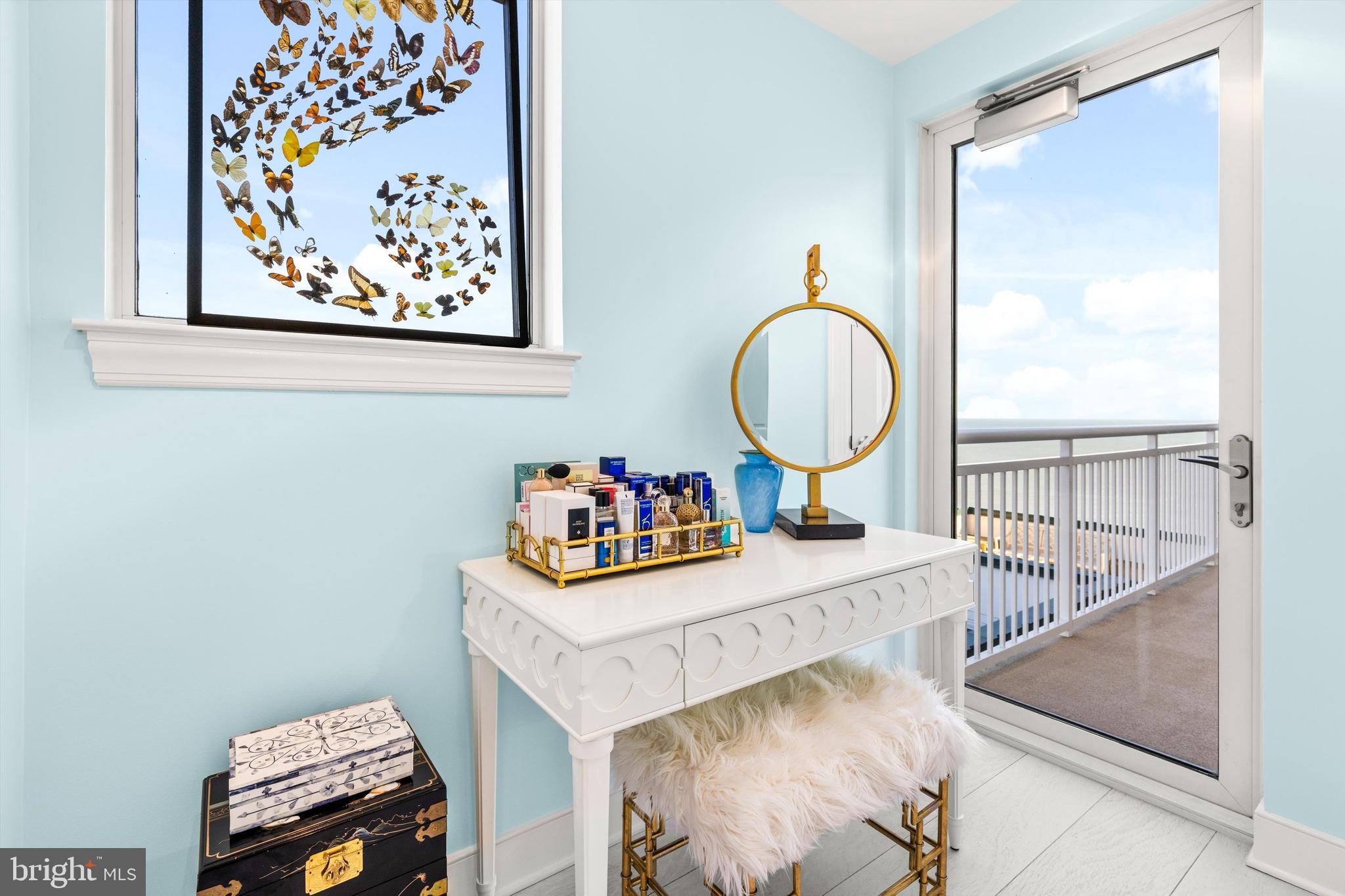 2 48th Street, Unit 1612 Ocean City, MD 21842 - Photo 43 of 90 a room with furniture and a mirror