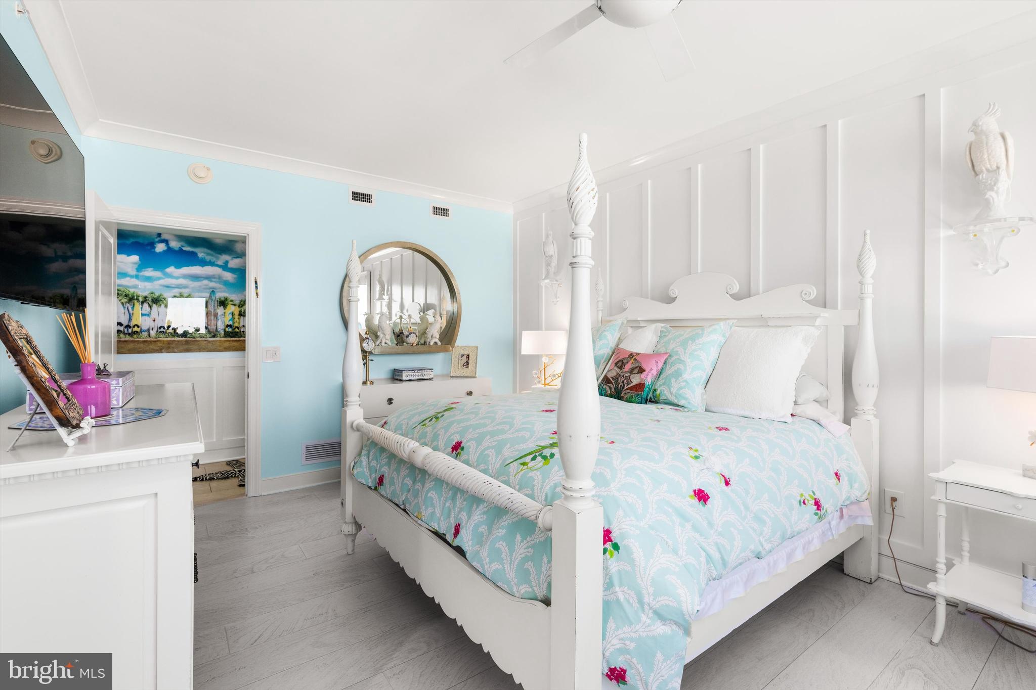 2 48th Street, Unit 1612 Ocean City, MD 21842 - Photo 50 of 90 a bedroom with a bed a couch and dresser