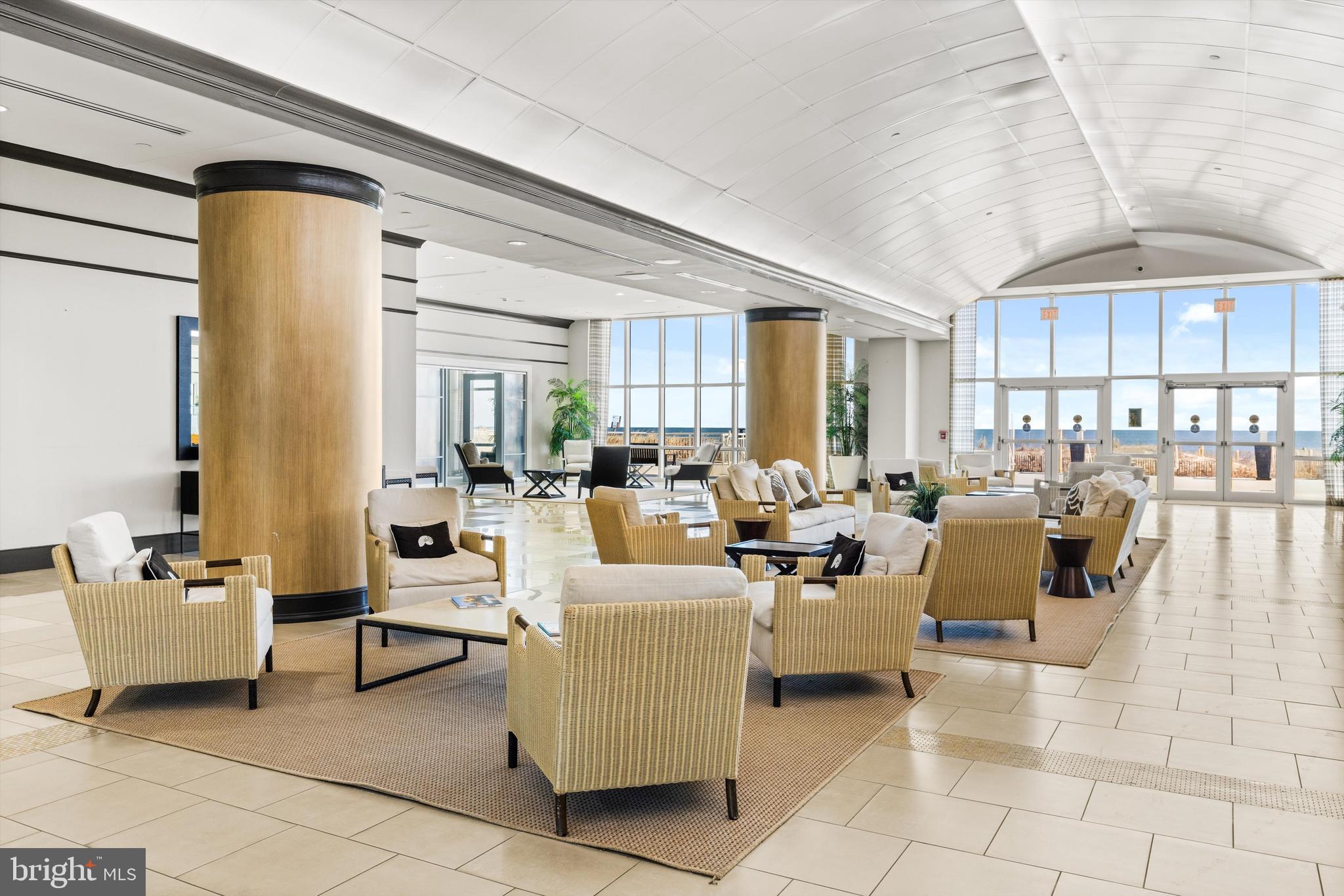 2 48th Street, Unit 1612 Ocean City, MD 21842 - Photo 60 of 90 a living room with furniture and a large window