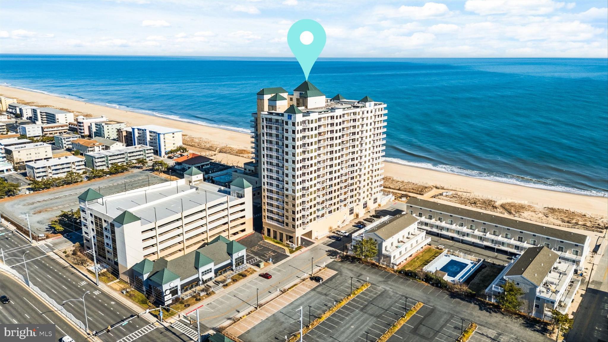 2 48th Street, Unit 1612 Ocean City, MD 21842 - Photo 70 of 90 a view of a balcony with floor to ceiling windows and wooden floor