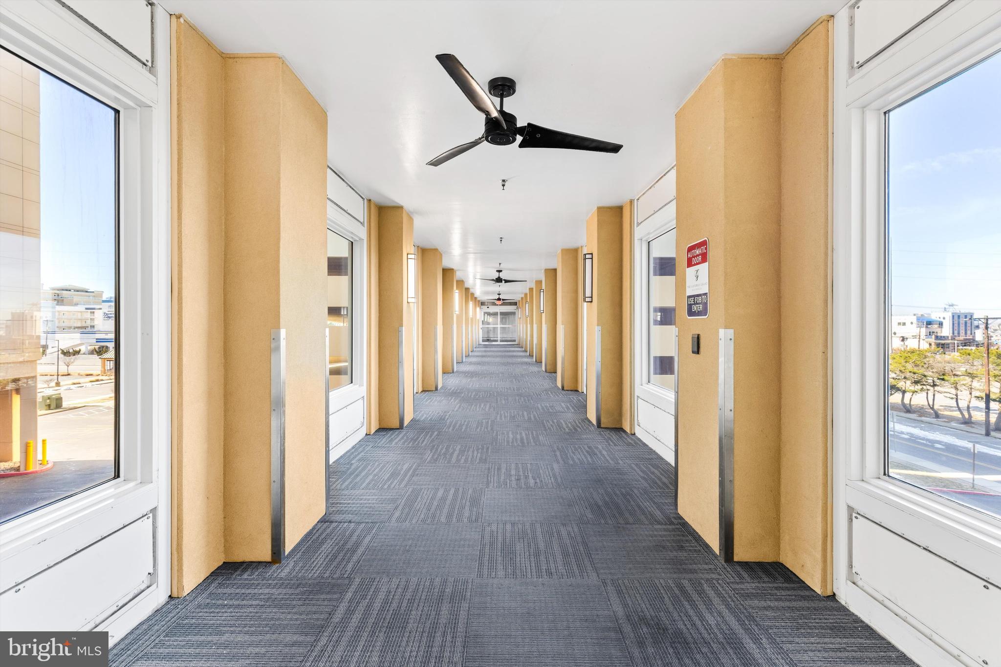 2 48th Street, Unit 1612 Ocean City, MD 21842 - Photo 80 of 90 a view of a hallway with wooden floor and closet area
