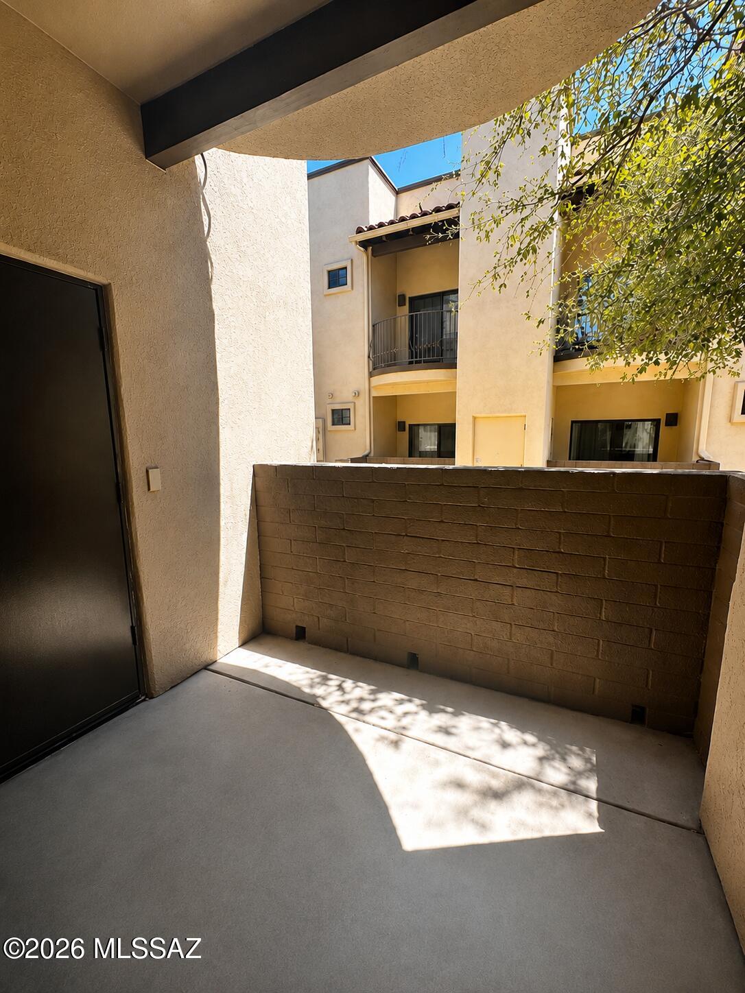 2018 East River Road, Unit 102 Tucson, AZ 85718 - Photo 23 of 25 a view of a bed in a room
