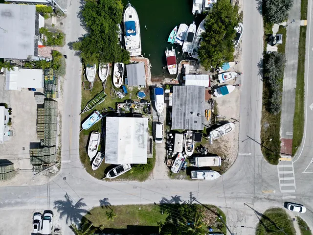 an aerial view of houses with outdoor space