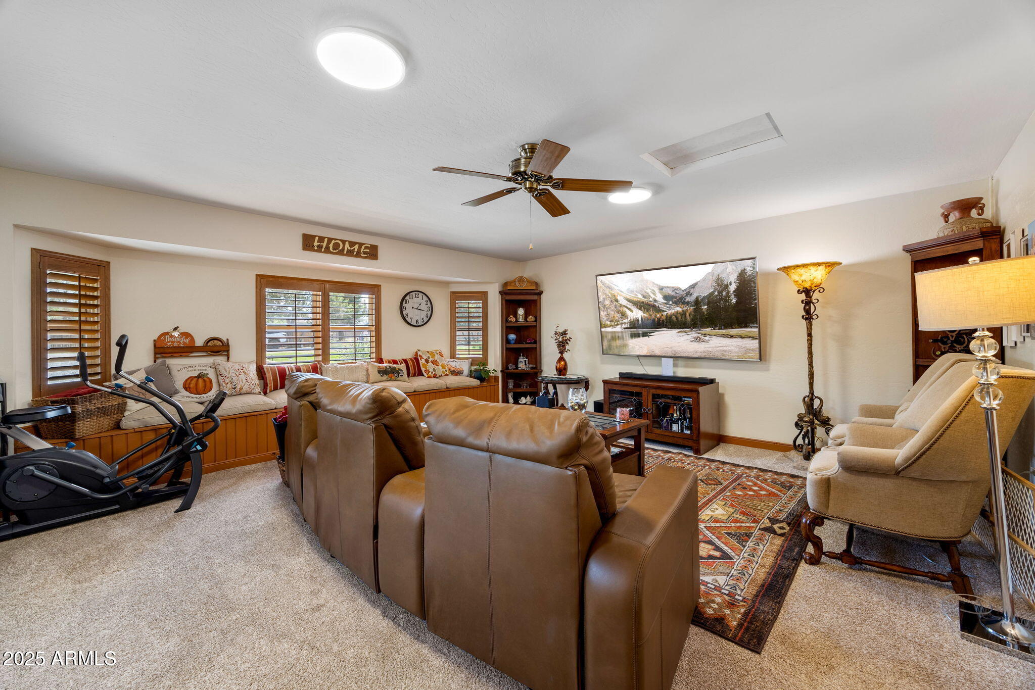 320 East 4th Avenue Eagar, AZ 85925 - Photo 12 of 38 a living room with furniture ceiling fan and a window