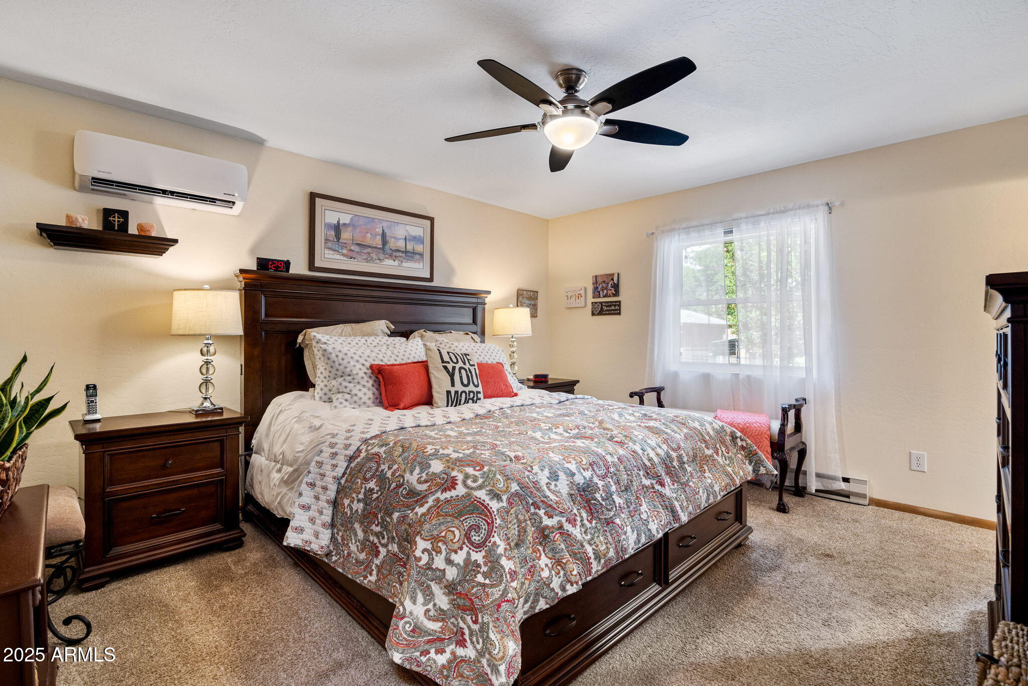 320 East 4th Avenue Eagar, AZ 85925 - Photo 14 of 38 a bedroom with a bed and a chandelier