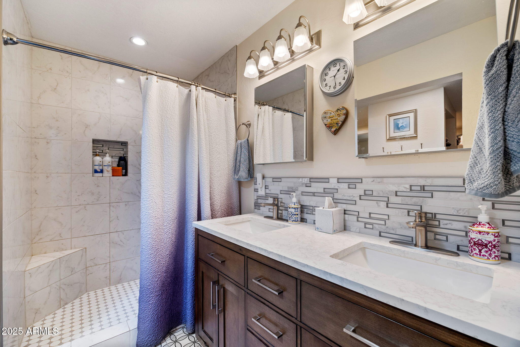 320 East 4th Avenue Eagar, AZ 85925 - Photo 16 of 38 a bathroom with a sink a mirror and a shower