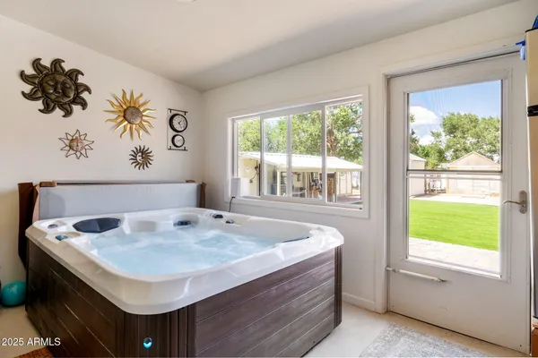 a bathroom with a sink and a window