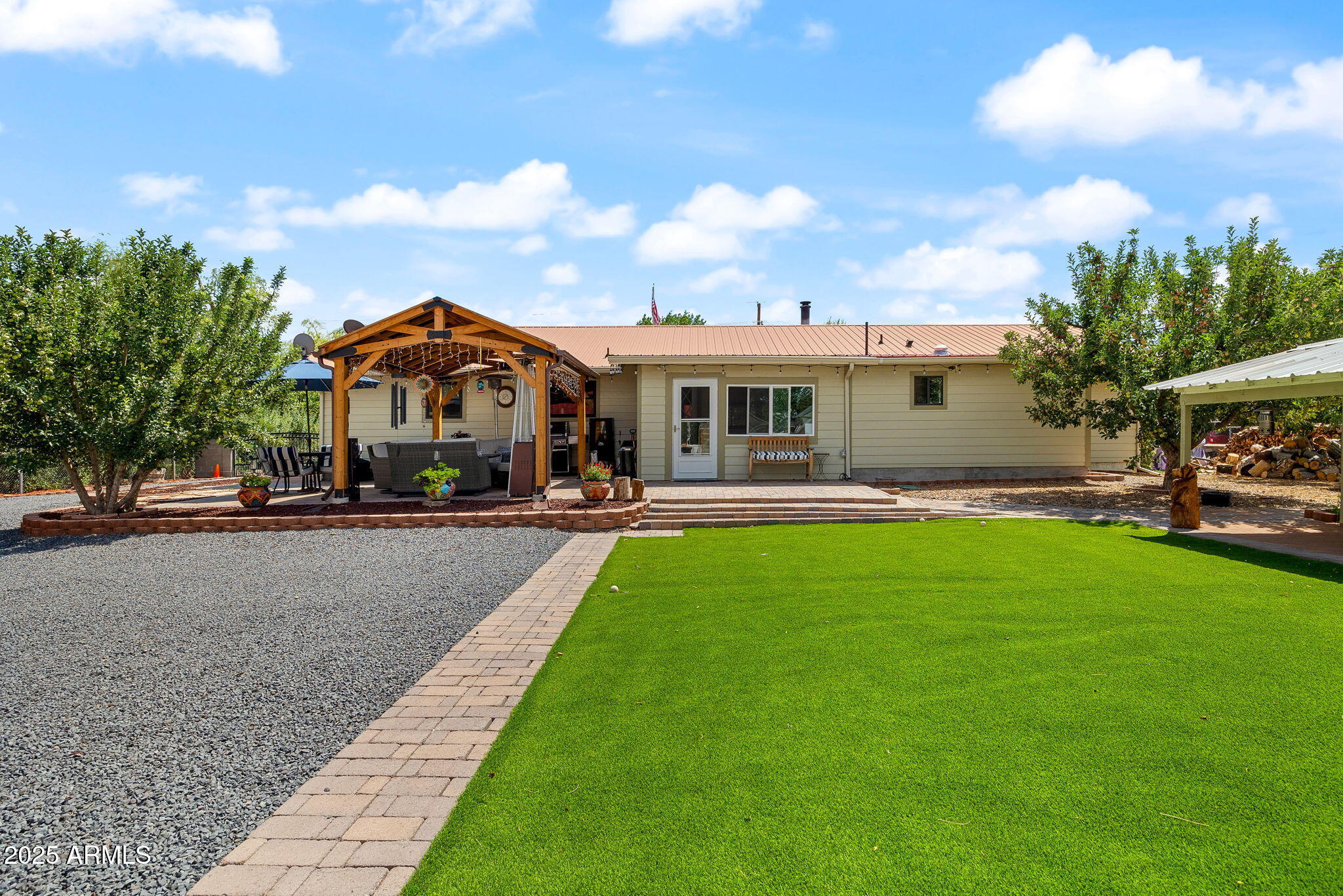320 East 4th Avenue Eagar, AZ 85925 - Photo 26 of 38 a swimming pool view with a seating space and a garden view