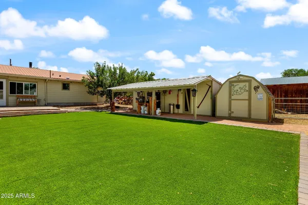 a view of a house with a big yard