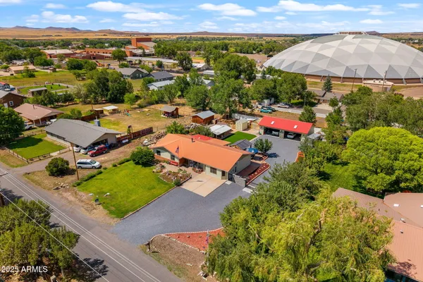 an aerial view of a house with a garden