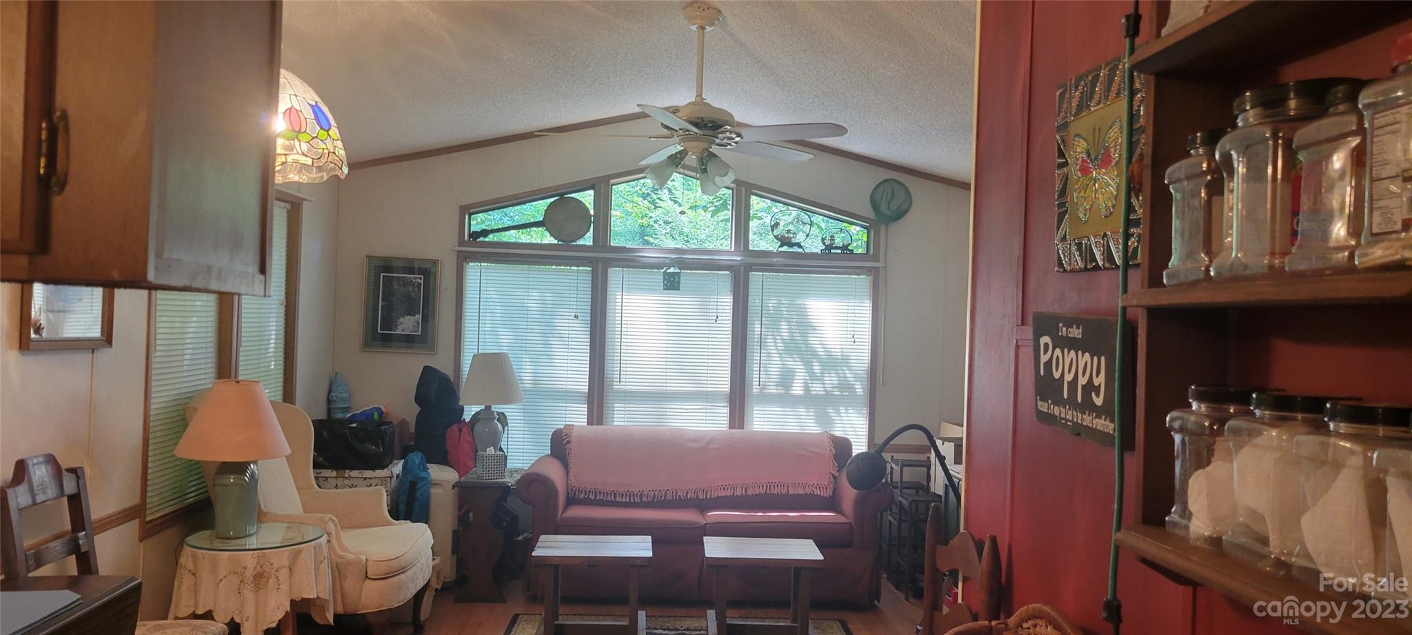 53 Eddie Cody Road Marshall, NC 28753 - Photo 3 of 10 a dining room with furniture a chandelier and window