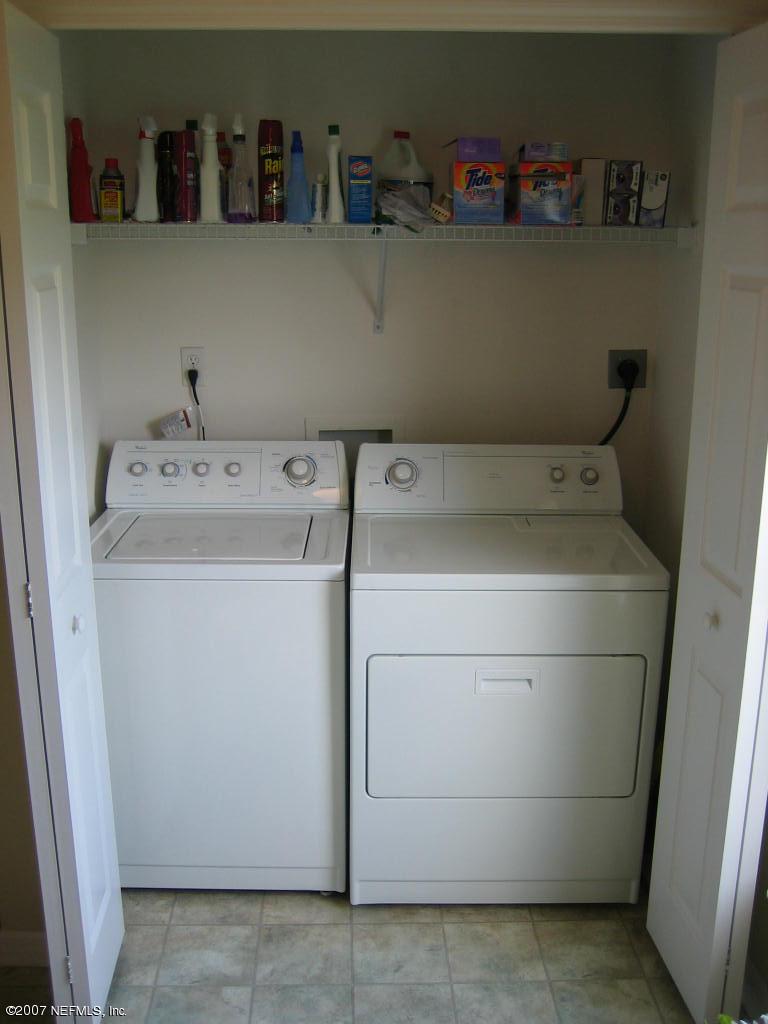 12584 North Reeding Ridge Drive West Jacksonville, FL 32225 - Photo 20 of 35 Inside laundry includes washer & dryer