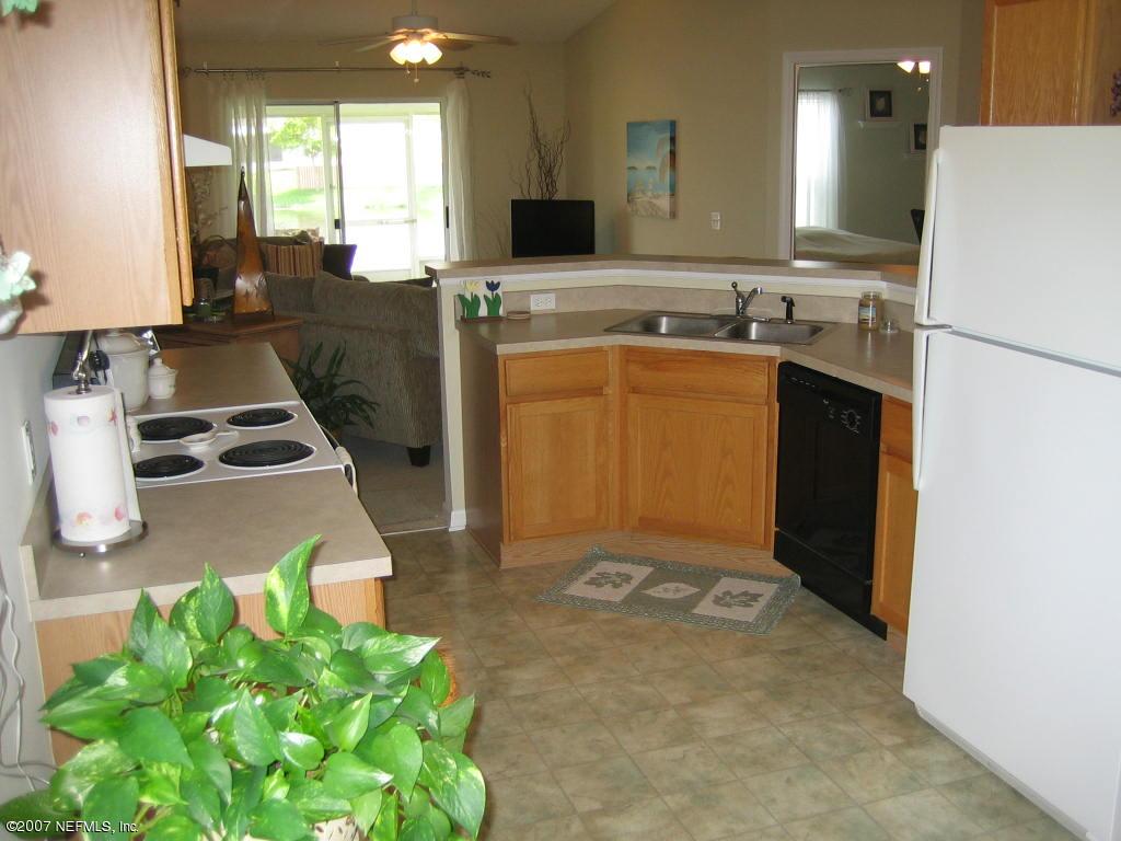 12584 North Reeding Ridge Drive West Jacksonville, FL 32225 - Photo 10 of 35 Kitchen has lake views