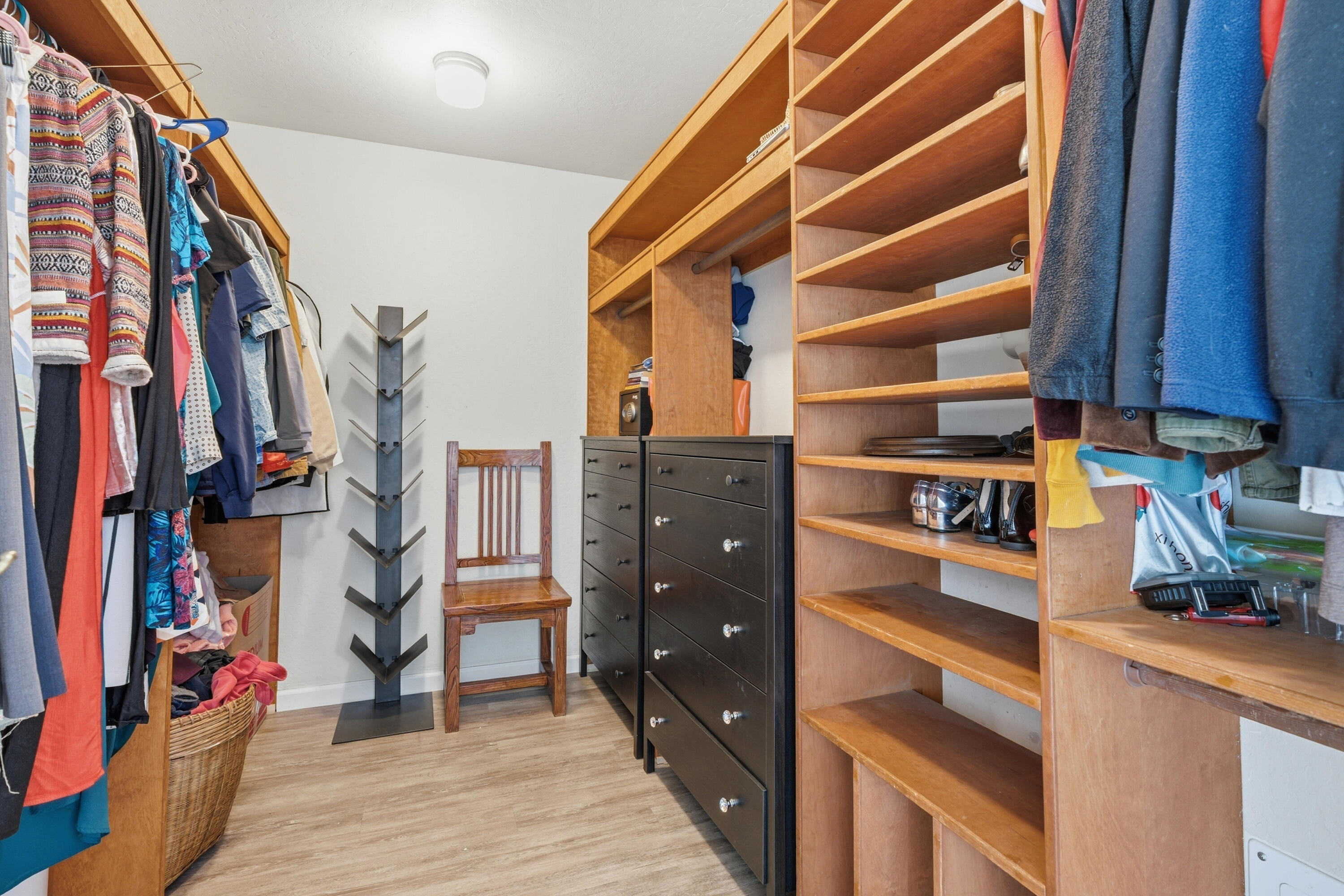 11385 Easy Street Redding, CA 96003 - Photo 29 of 55 a view of walk in closet with clothes and shoes