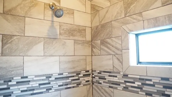 a bathroom with a toilet and a sink