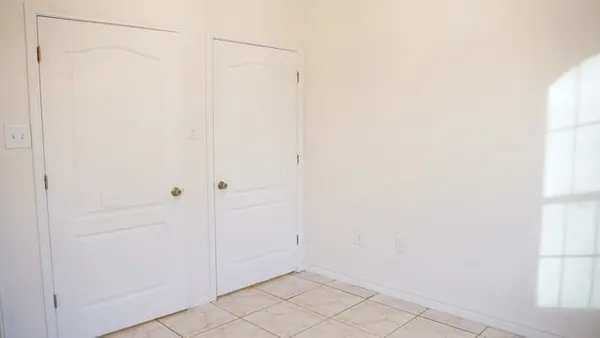 a view of a kitchen with a refrigerator