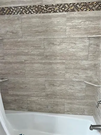 a bathroom with a bathtub