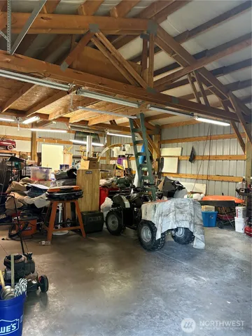 a view of parking garage with cars