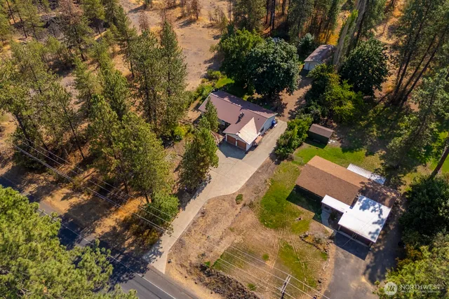 an aerial view of residential house with outdoor space