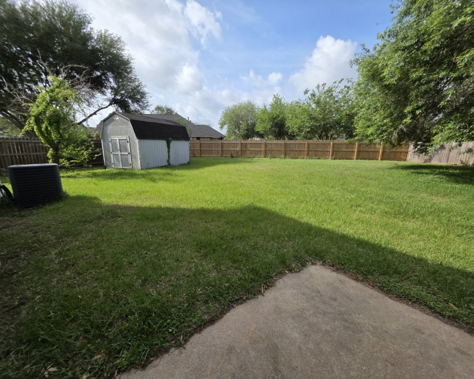129 Corral Court Angleton, TX 77515 - Photo 25 of 26 Storage shed in the back