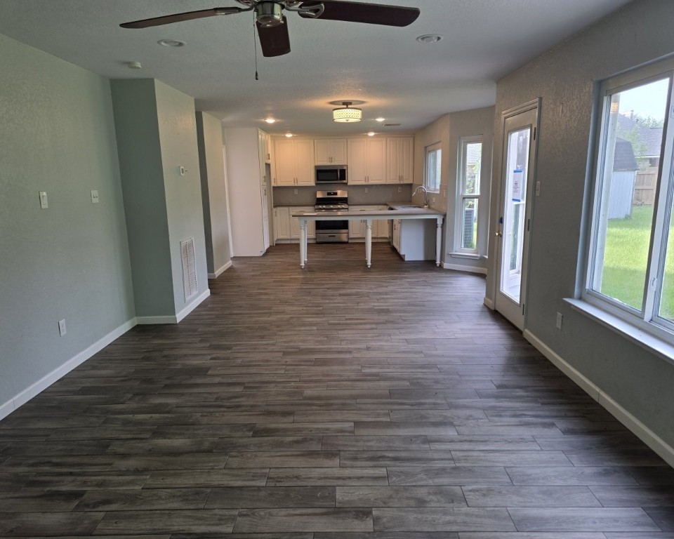 129 Corral Court Angleton, TX 77515 - Photo 3 of 26 View from the living area towards the kitchen