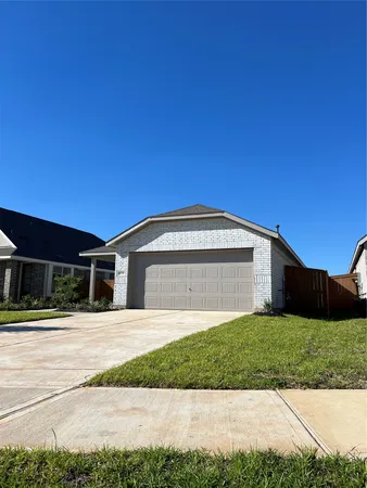a front view of a house with a garage