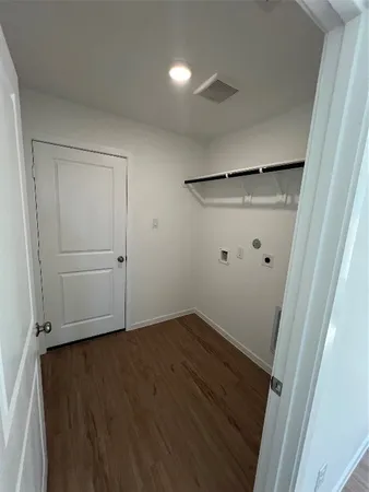 a view of an empty room and entryway