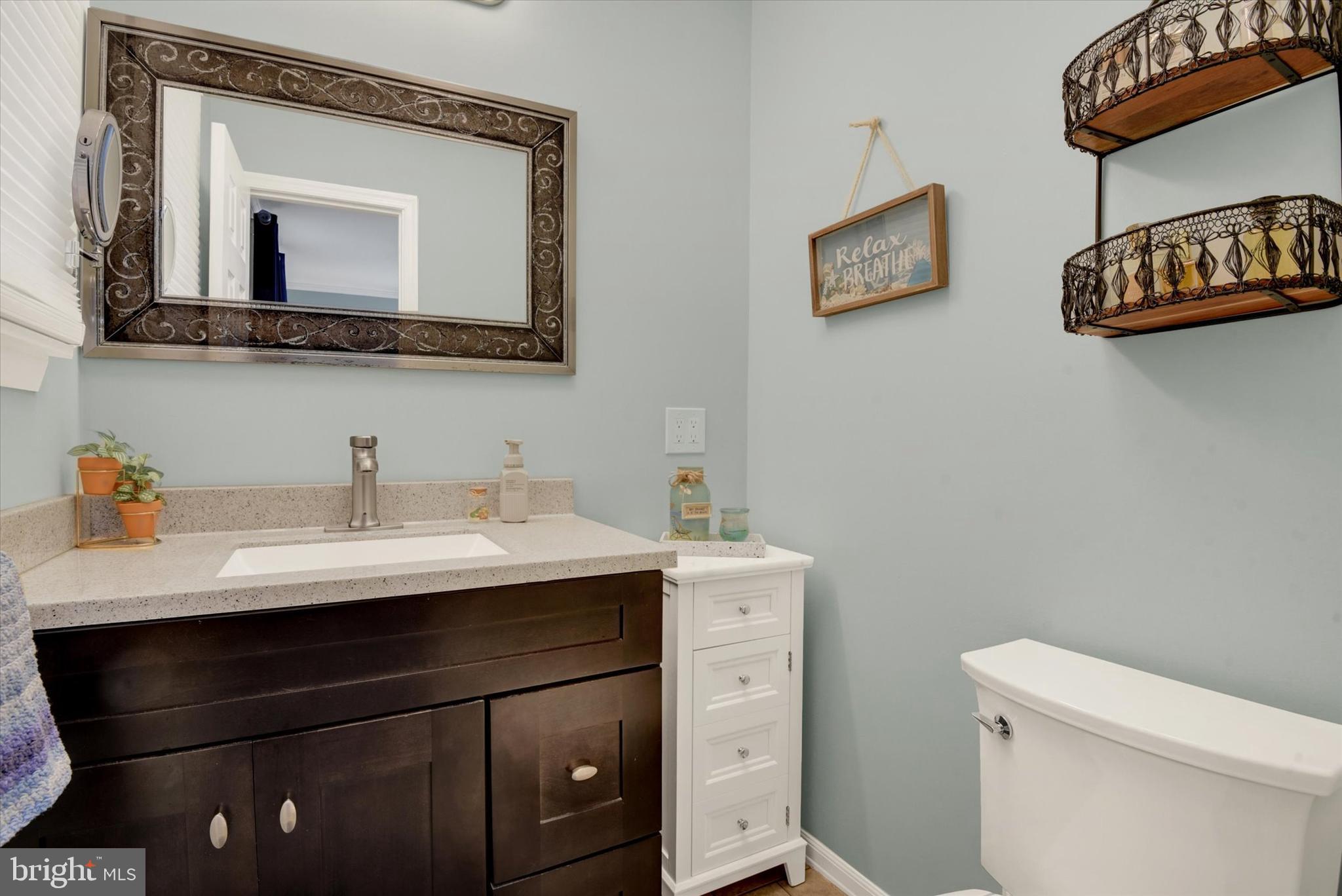 2116 Paddock Lane Finksburg, MD 21048 - Photo 14 of 35 a bathroom with a sink vanity and a toilet