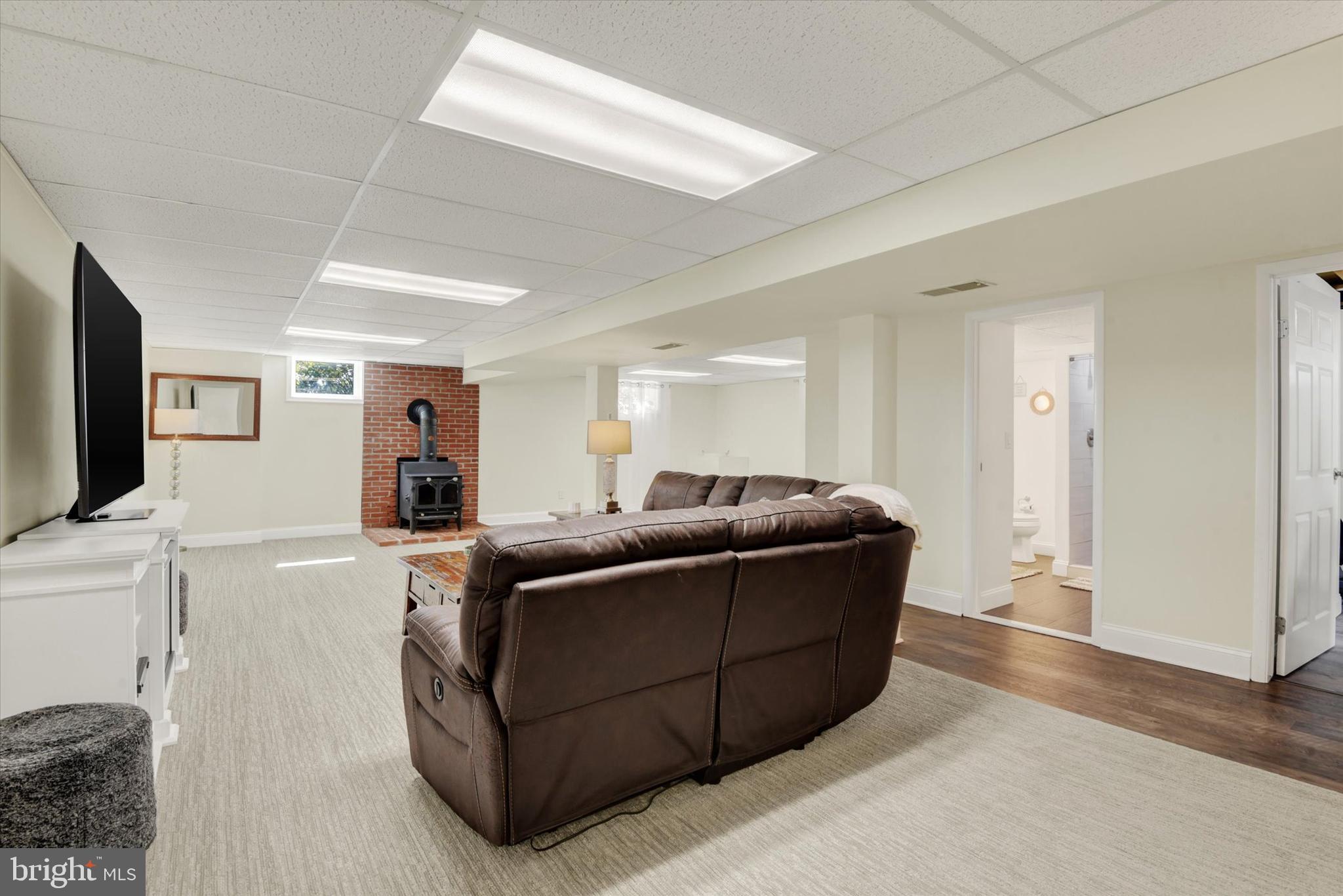2116 Paddock Lane Finksburg, MD 21048 - Photo 18 of 35 a living room with furniture and a flat screen tv