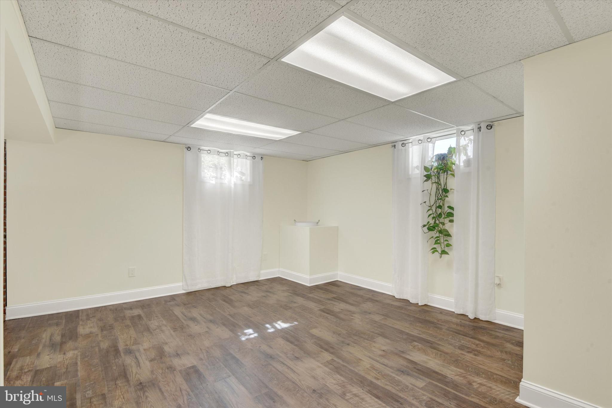 2116 Paddock Lane Finksburg, MD 21048 - Photo 19 of 35 an empty room with windows and entrance